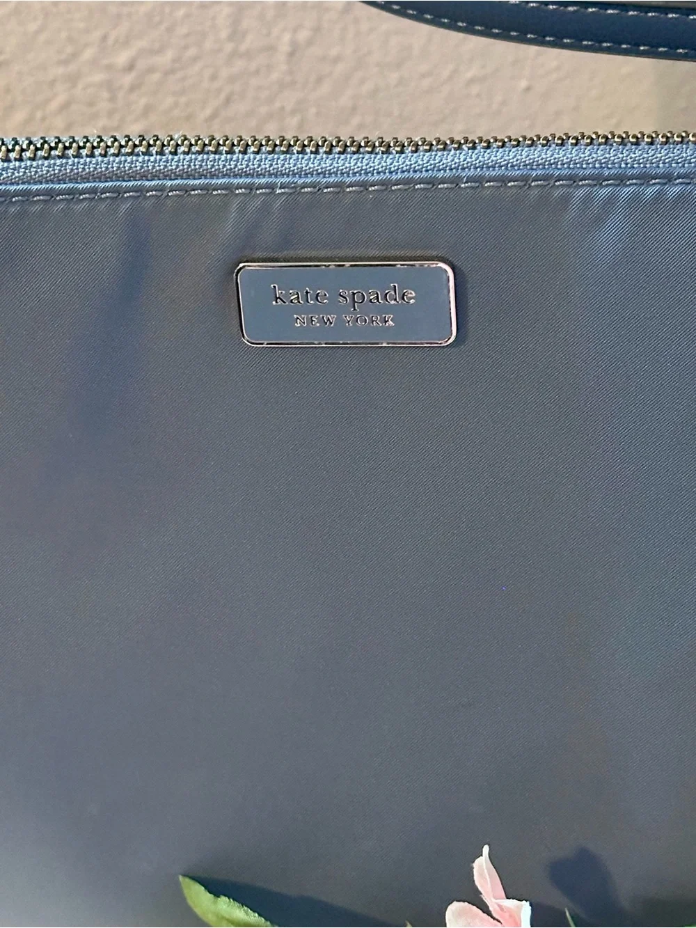 Kate Spade navy blue leather crossbody bag with adjustable strap